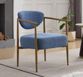 blue Blue Fabric Dining Chair with Wood‑Grain Metal Frame - front view in modern dining room
