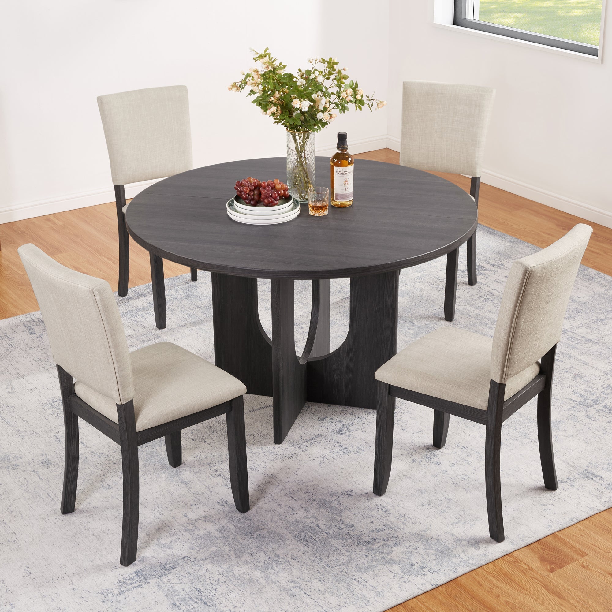 5-piece round dining set with wooden table and 4 upholstered chairs