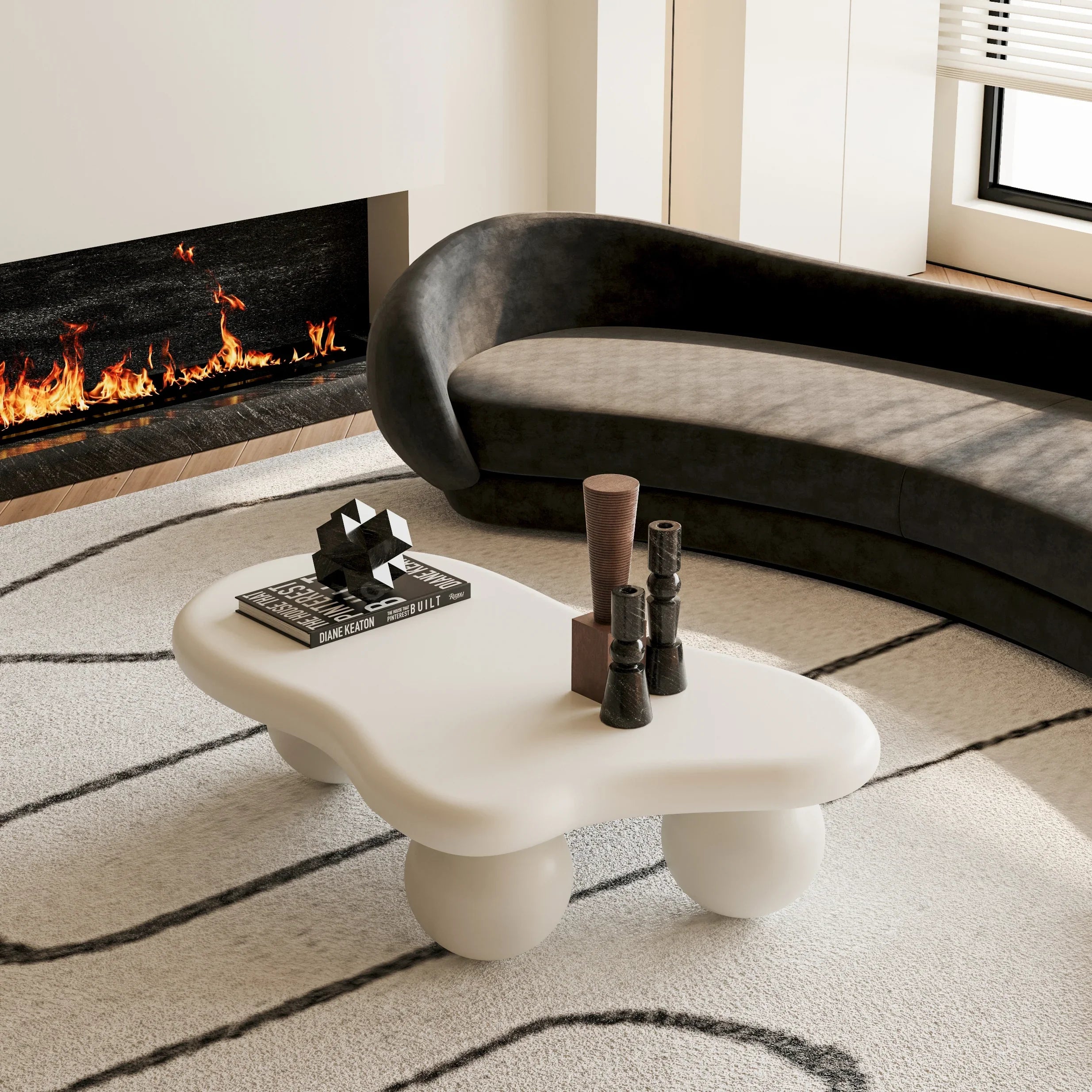 Modern living room with curved black sectional sofa, organic white coffee table, and fireplace