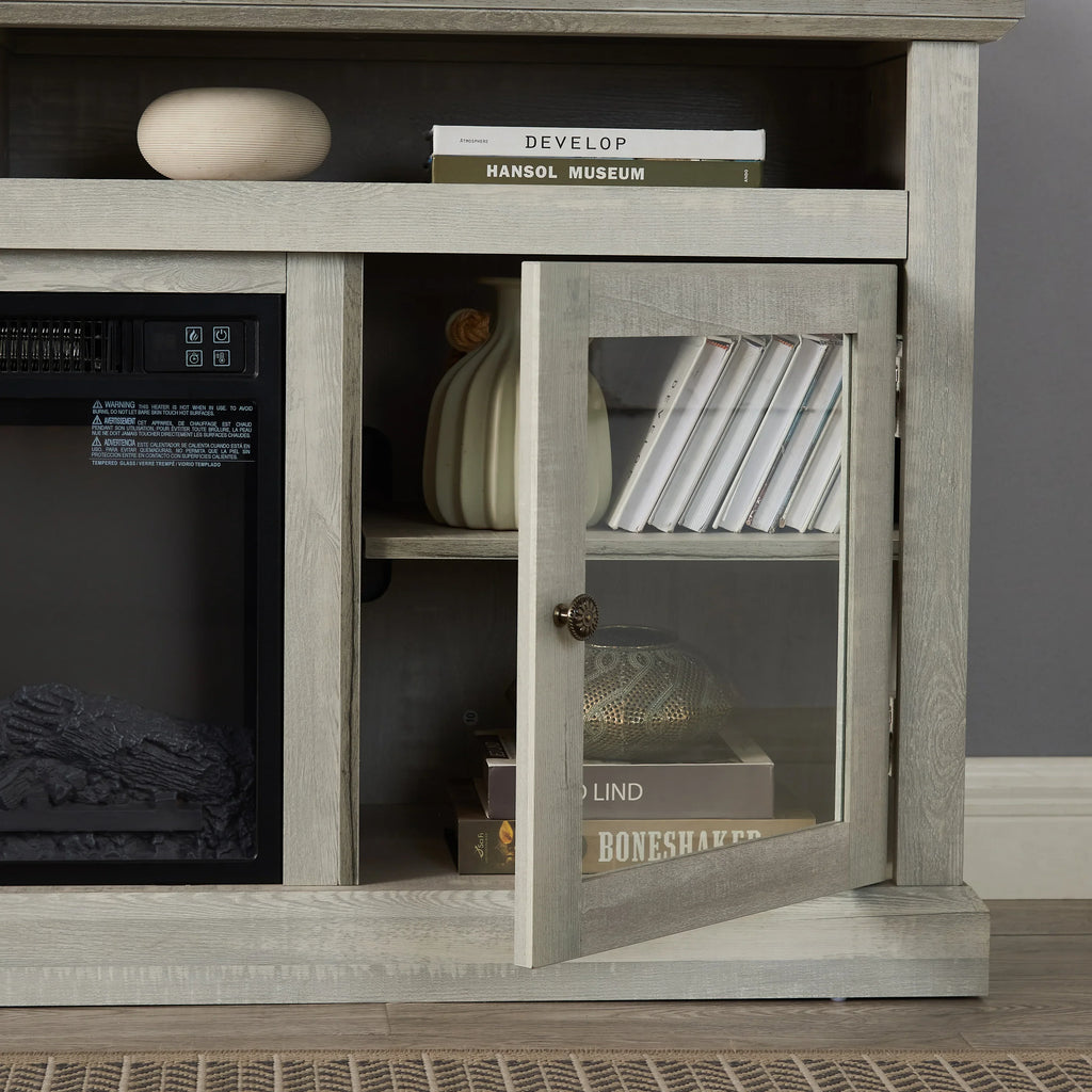 Modern wood cabinet with glass door, books, decorative vase, and minimalist decor in living room