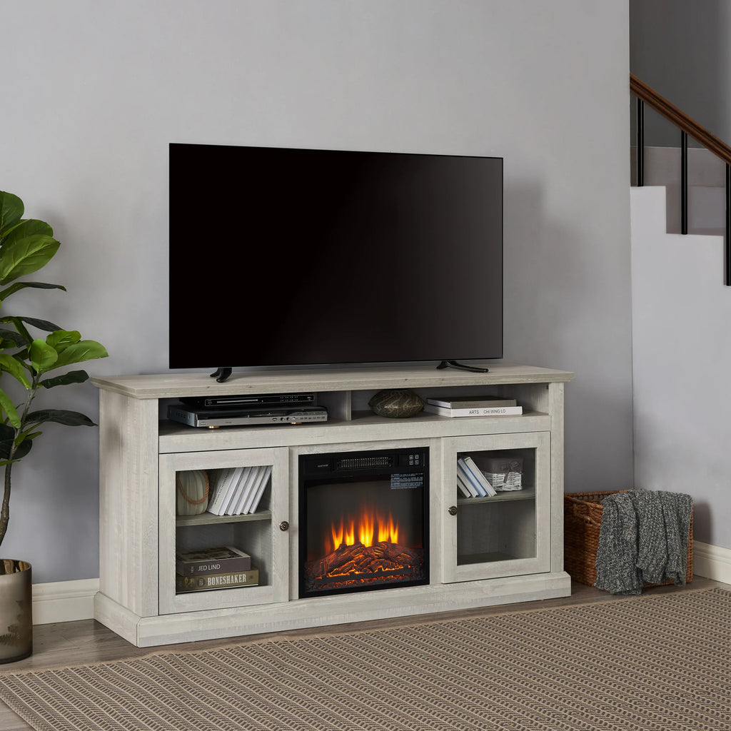 Modern TV stand with built-in electric fireplace and glass doors in a cozy living room