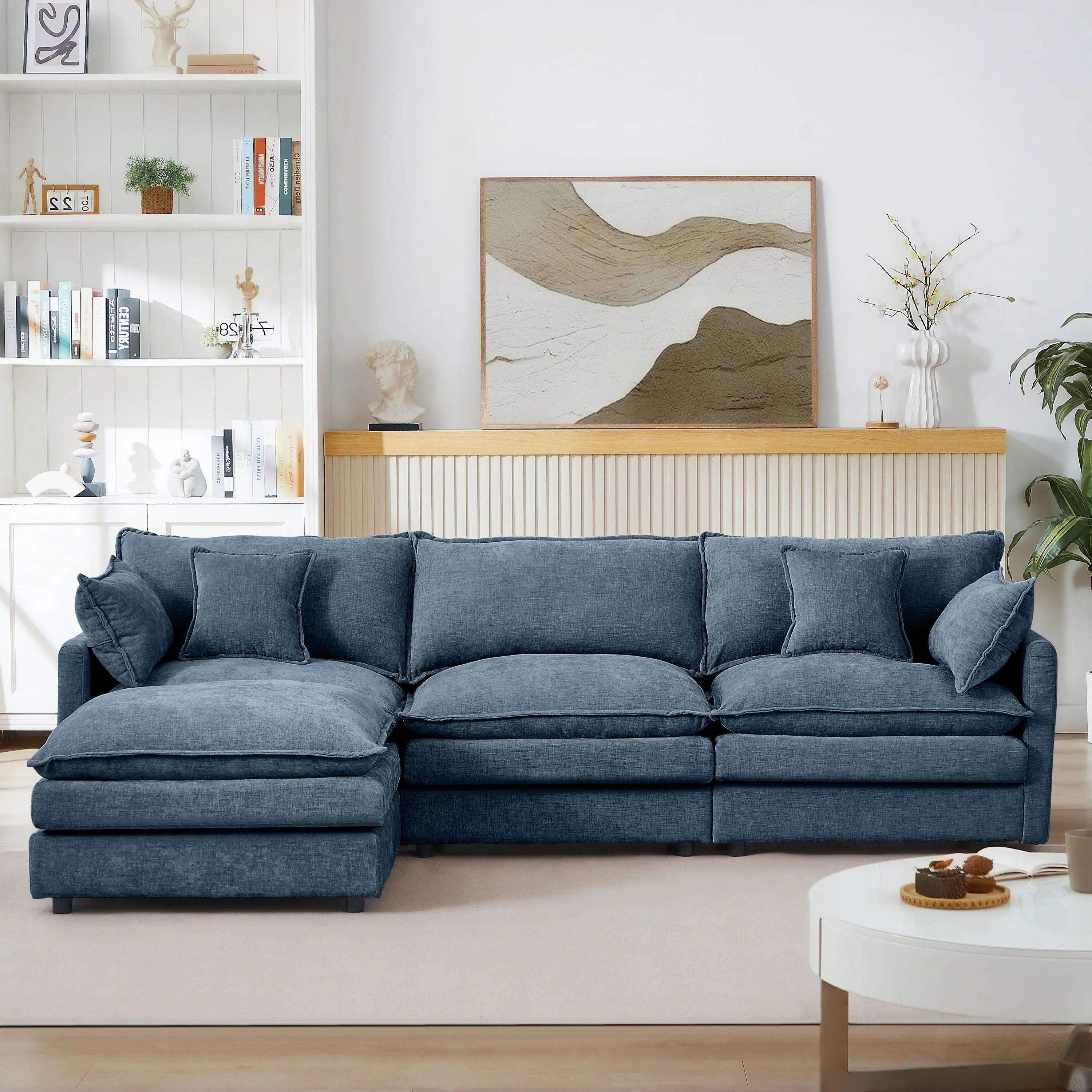 Modern blue chenille modular sectional sofa in a stylish contemporary living room