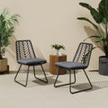 gray Deja Outdoor Chair with Cushions - front view in modern outdoor space